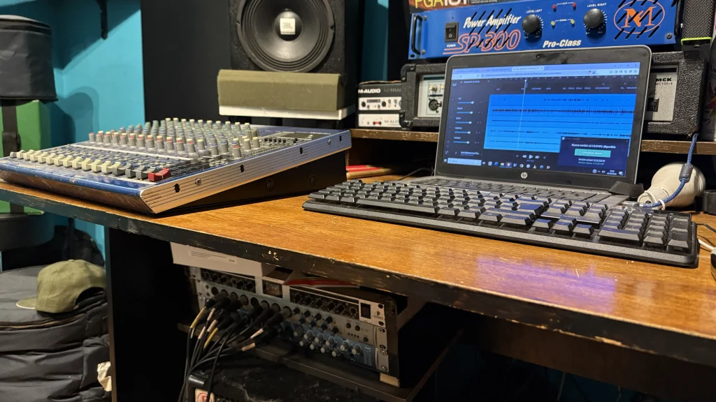 Multi-track drum recording setup with audio interface and microphones