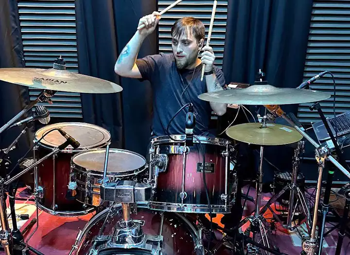 Remote drum recording setup with professional microphones