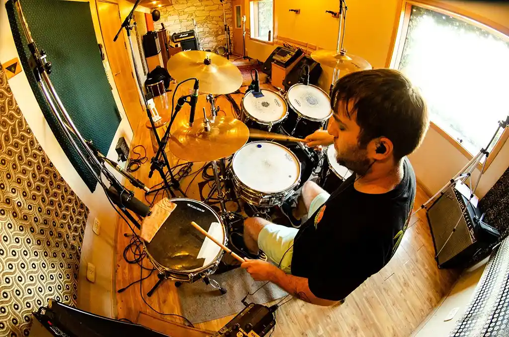 Online session drummer recording drum tracks for artists and producers