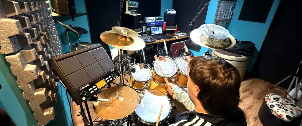 Ezequiel Drumkid recording drums remotely in his home studio