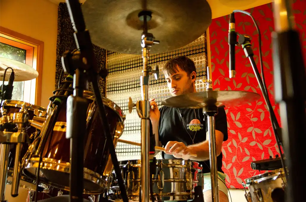 Session drummer Ezequiel "Drumkid" tracking drums during a recording session